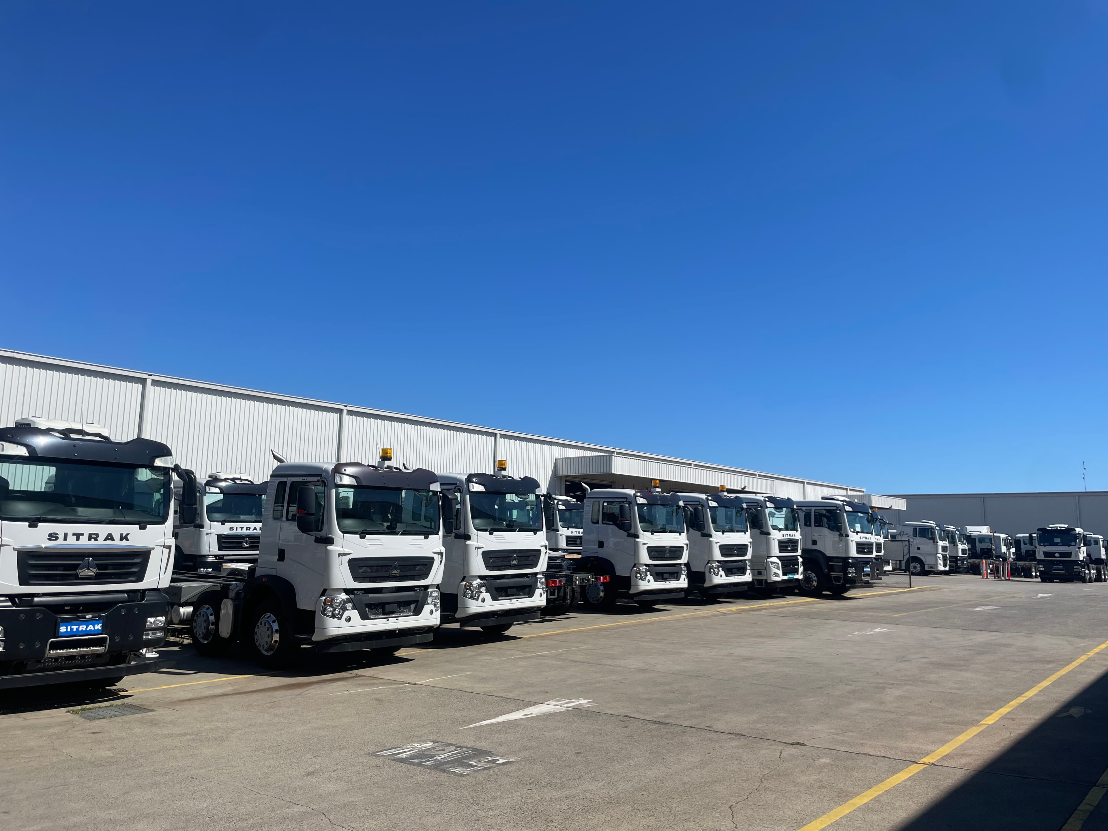 Sitrak-trucks-outside